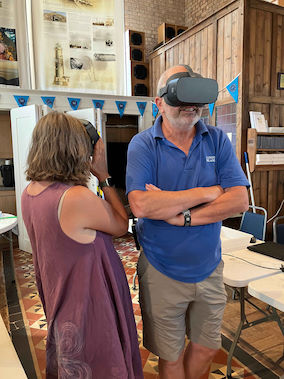 The chance to immerse yourself (yet stay dry!) and play with seals under water whilst wearing a Virtual Reality headset, proved popular with visitors and staff alike! © Issy Irving